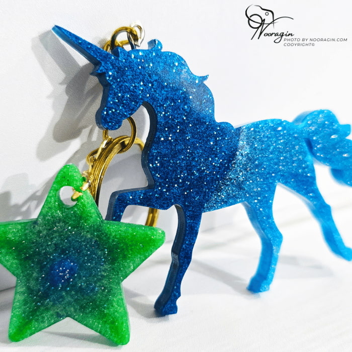 جاکلیدی یونیکورن یخی رزینی یک جاکلیدی خاص و فانتزی ، ساخته شده با بهترین کیفیت اکلیل و رزین