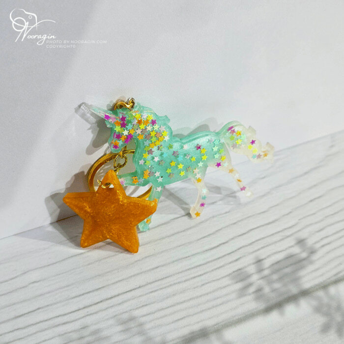 جاکلیدی یونیکورن رزینی مدل ستاره ، خرید جاکلیدی اسب تک شاخ همراه با آویز ستاره از Nooragin