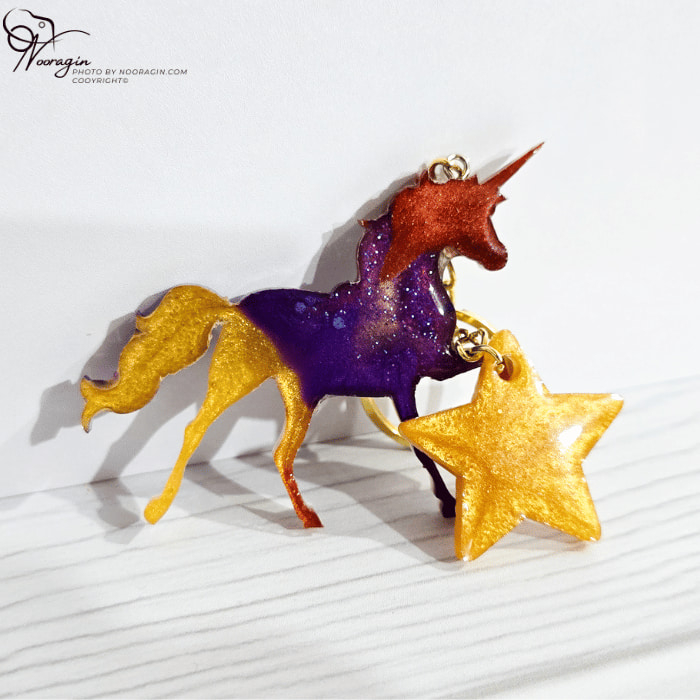 جاکلیدی یونیکورن رزینی مدل رنگارنگ با طراحی خاص و فانتزی، بهترین جاکلیدی برای هدیه دخترانه